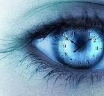 Picture of a woman's eye with a clock superimposed on iris.